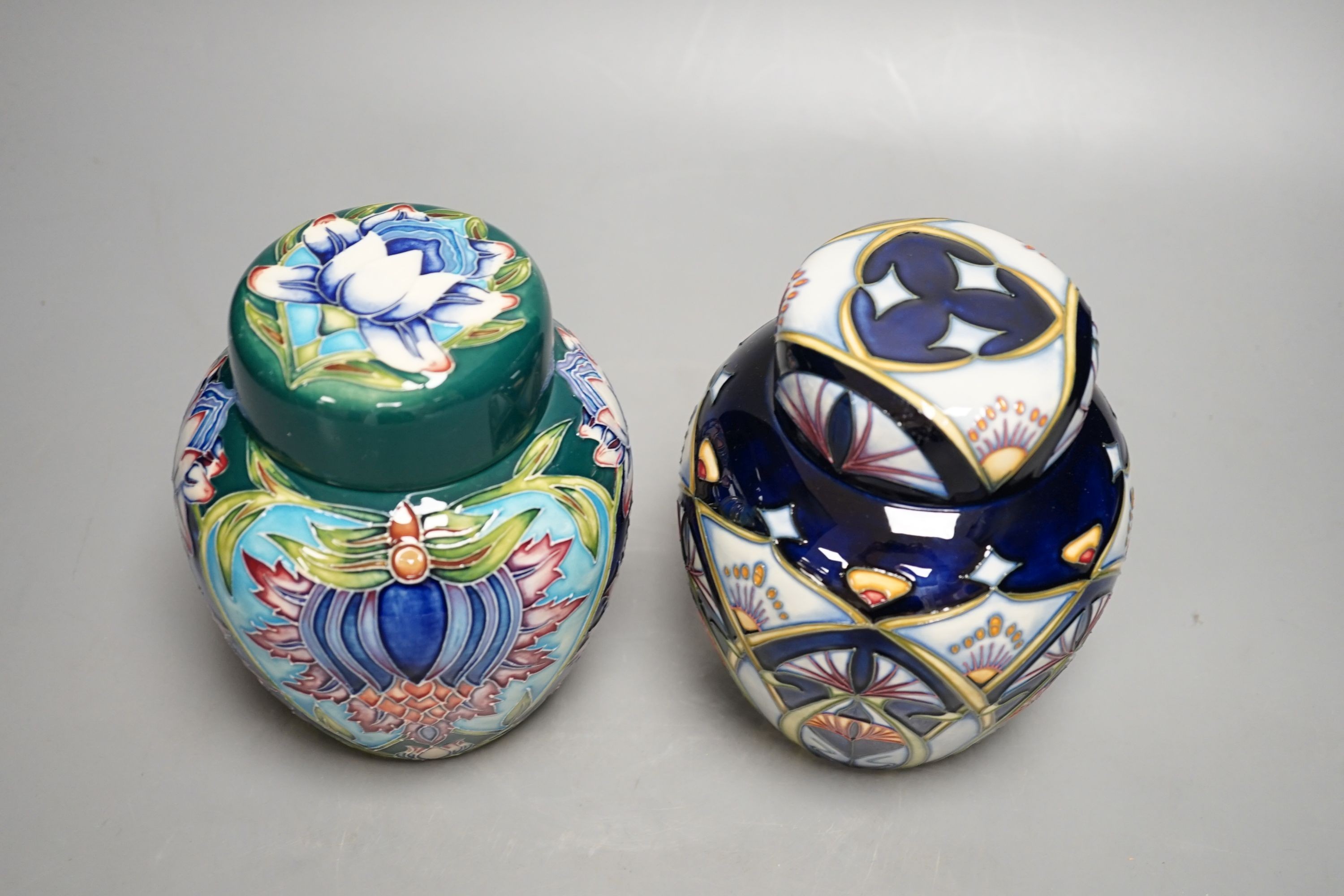Two Moorcroft trial ginger jars and covers, signed Rachel Bishop and Shirley Hayes, 2001 and 2002, 16cm., with boxes